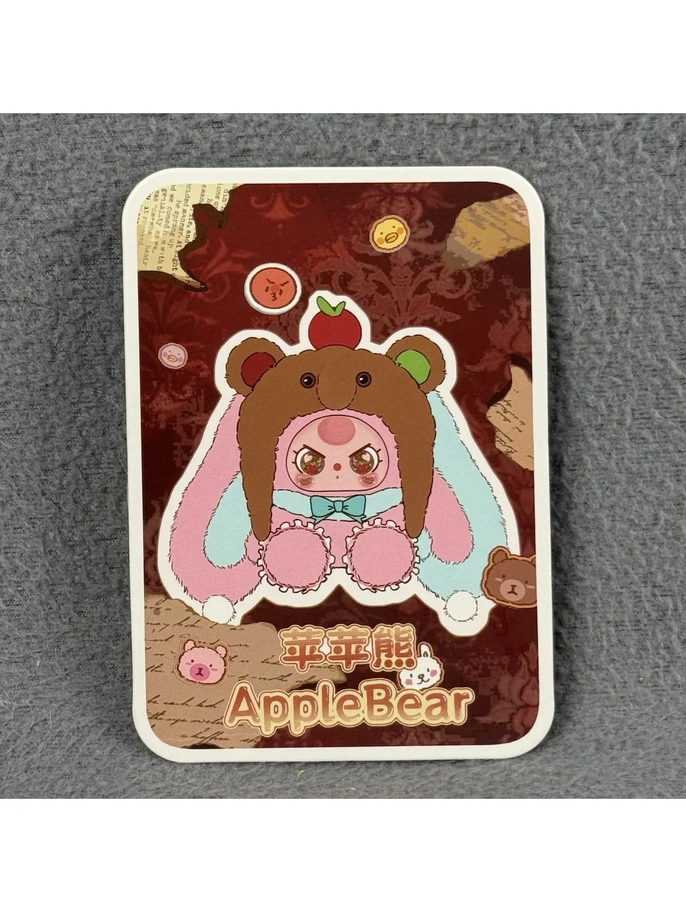 Confirmed - Baby Three 500% Hat Poster - Apple Bear